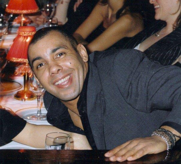 My girlfriend and I enjoying the Moulin Rouge in Paris before my brain operation changed my life.