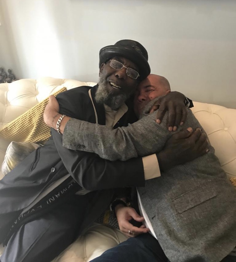 Chris embracing his father after 50 years apart