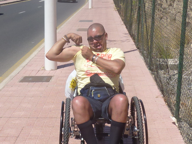 Flexing my muscles in the sunshine—a playful moment showing that my strength and confidence were still there.