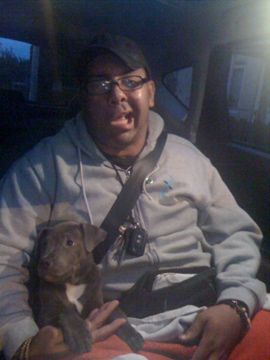 Holding my new puppy for the first time—the beginning of a loyal and loving friendship.