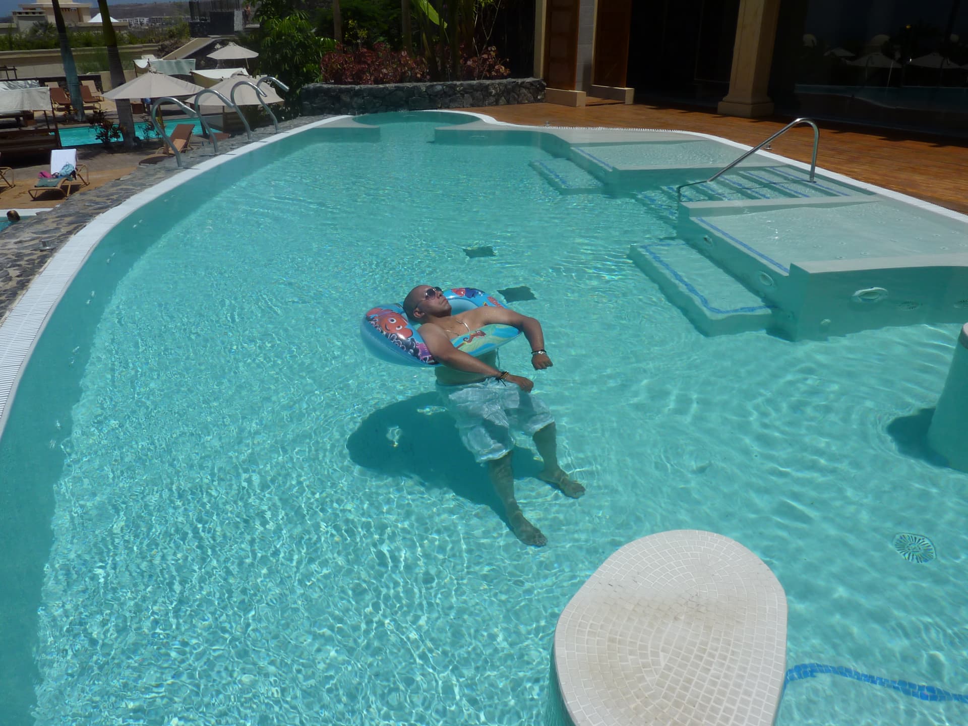 Floating peacefully in the swimming pool and enjoying the sunshine in Gran Canaria.