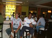 Relaxing with my friends at our hotel bar in Brazil, enjoying life before my brain operation.