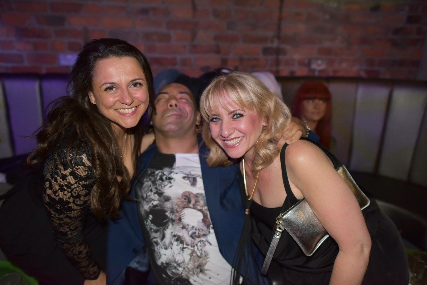 Enjoying a brilliant night out with my good friends Caroline and Tu—friendship and happiness captured in one photograph.