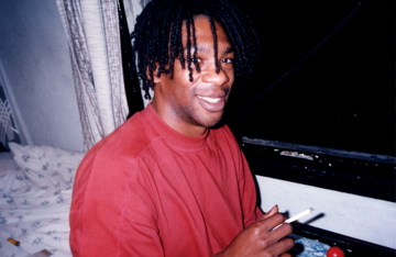 My old friend Kenny relaxing at my mum's house—a memory from years gone by.