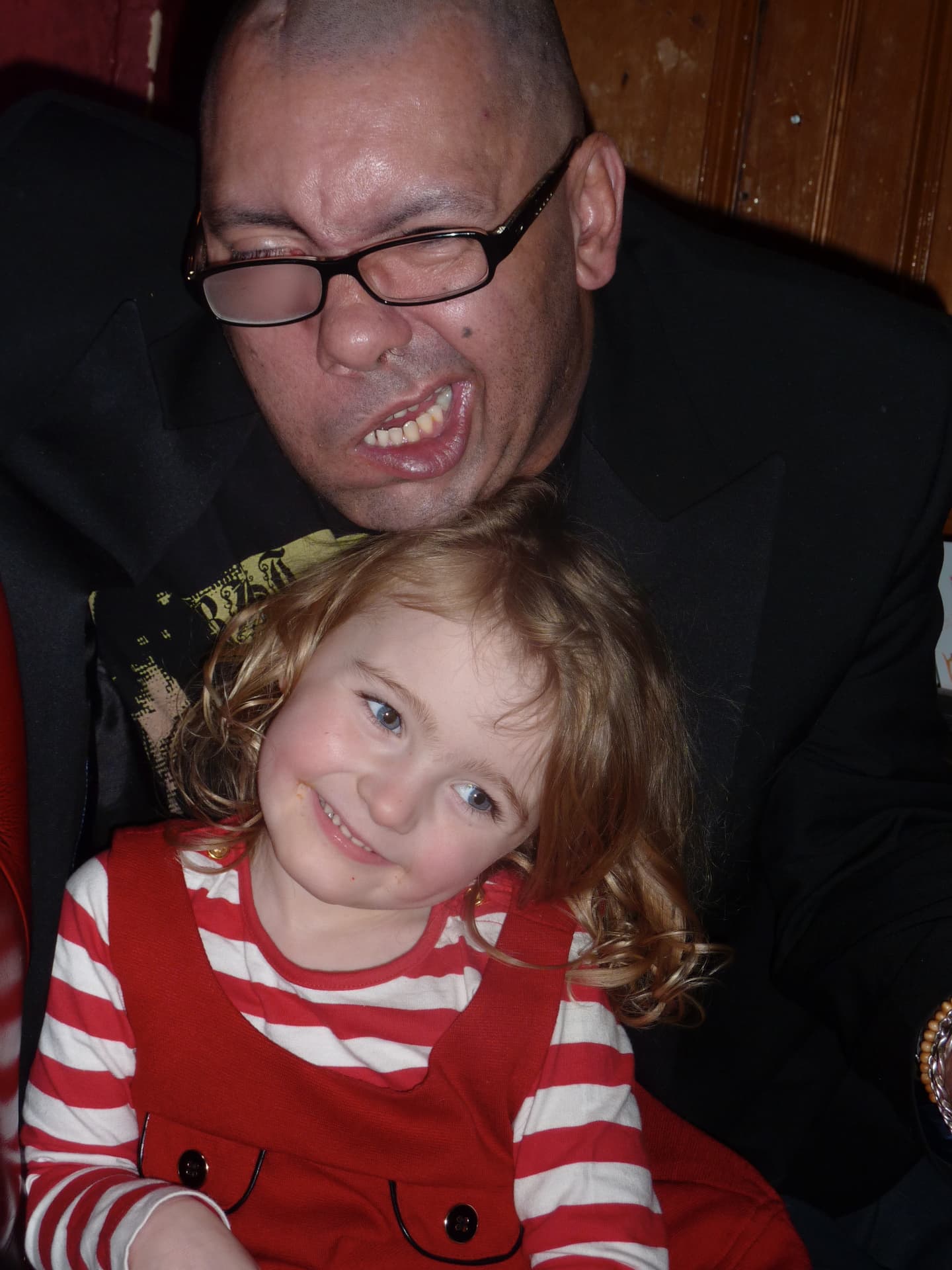 Sharing a lovely moment with my friend's daughter—her beautiful smile made this photograph unforgettable.